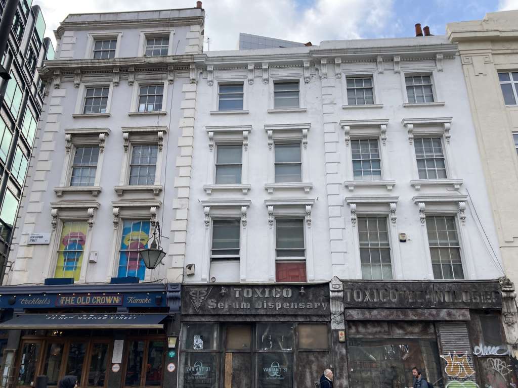 Grade II listed Nos 35 and 37 New Oxford St to the right adjoin The Old Crown PH (SBH)