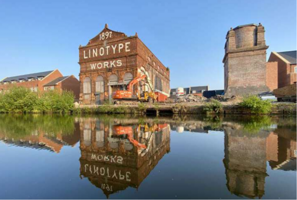 View of the Engine House and chimney base across the Bridgewater Canal (Photo: Calderpeel Architects